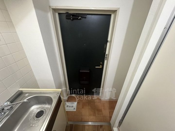 大阪府豊中市螢池北町1丁目の賃貸マンションの玄関