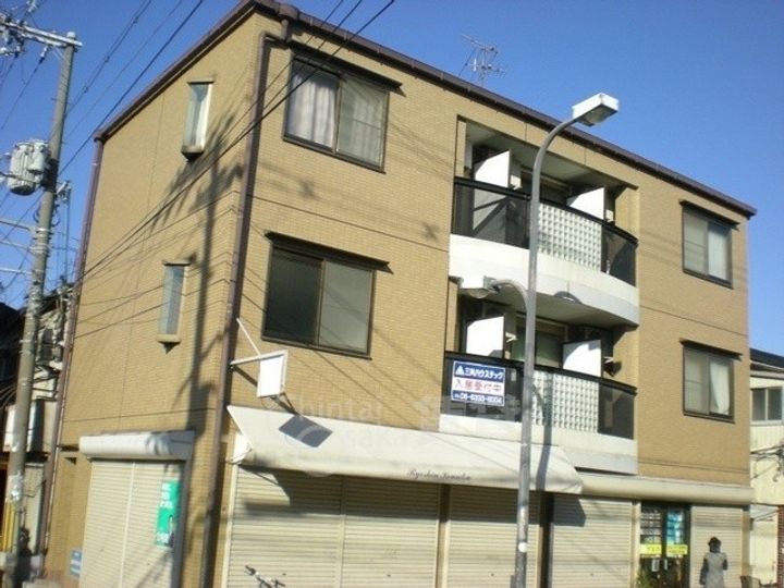 大阪府豊中市服部西町2丁目の賃貸マンションの外観