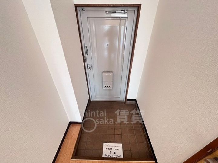 大阪府豊中市上野西4丁目の賃貸マンションの玄関