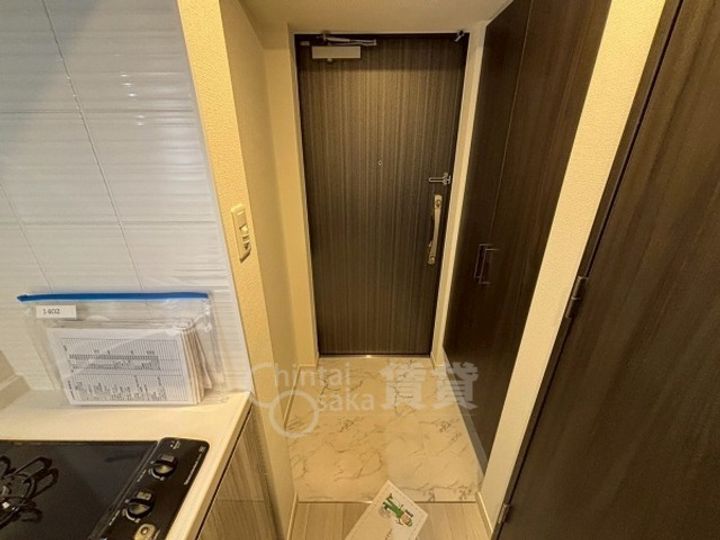 大阪府摂津市千里丘1丁目の賃貸マンションの玄関