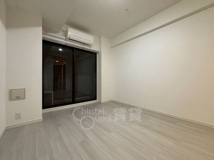 大阪府摂津市千里丘1丁目の賃貸マンションの居間