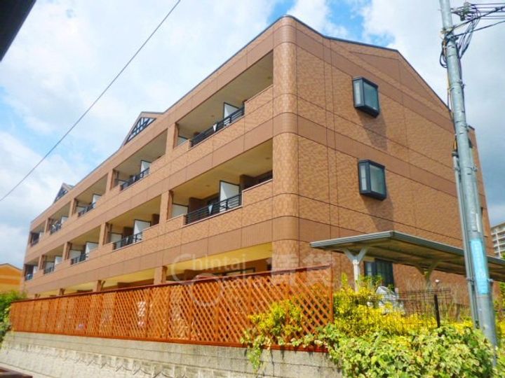 大阪府茨木市彩都あさぎ5丁目の賃貸マンションの外観