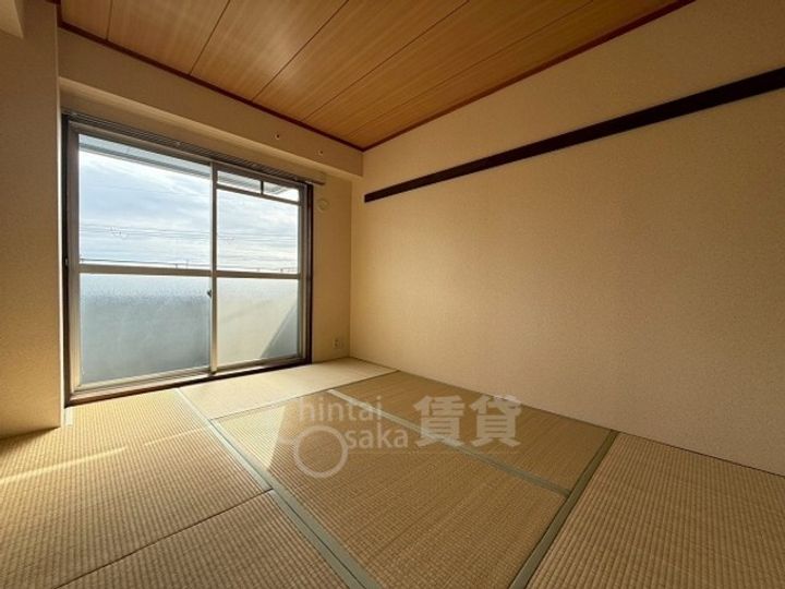 大阪府池田市天神1丁目の賃貸マンションの居間