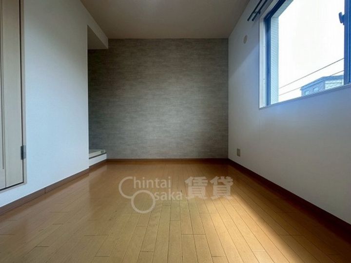 大阪府吹田市山手町3丁目の賃貸マンションの居間