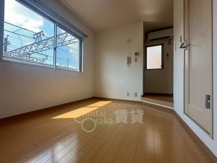 大阪府吹田市山手町3丁目の賃貸マンションの居間