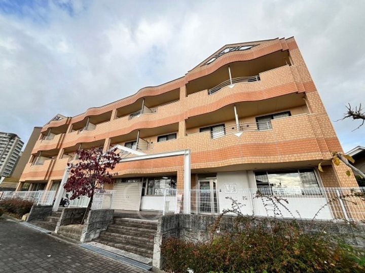 大阪府茨木市彩都あさぎ5丁目の賃貸マンションの外観