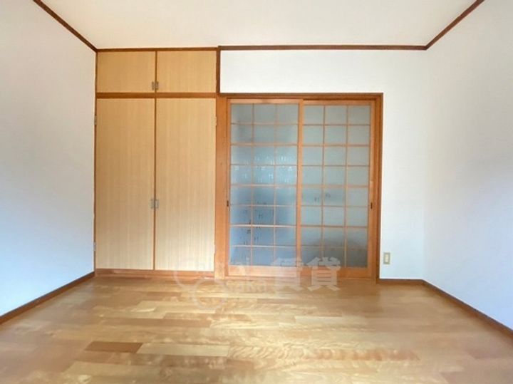 大阪府池田市石橋4丁目の賃貸マンションの居間