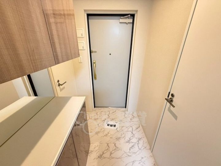 プロスパーホワイトベースの玄関