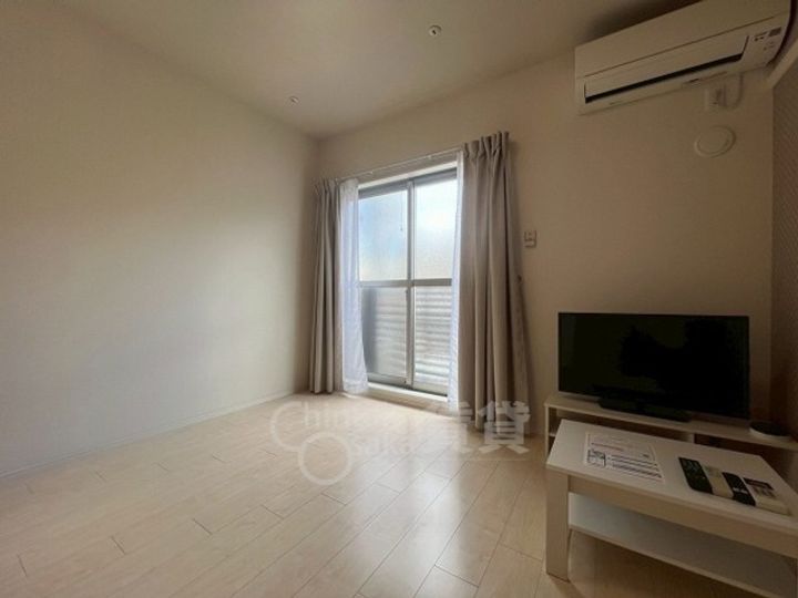 大阪府大阪市東淀川区東中島4丁目の賃貸マンションの居間