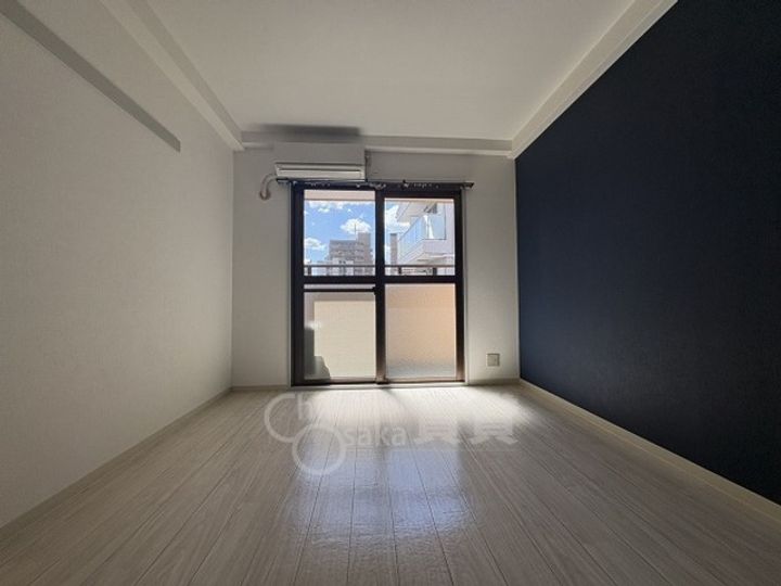 大阪府大阪市東淀川区上新庄3丁目の賃貸マンションの居間