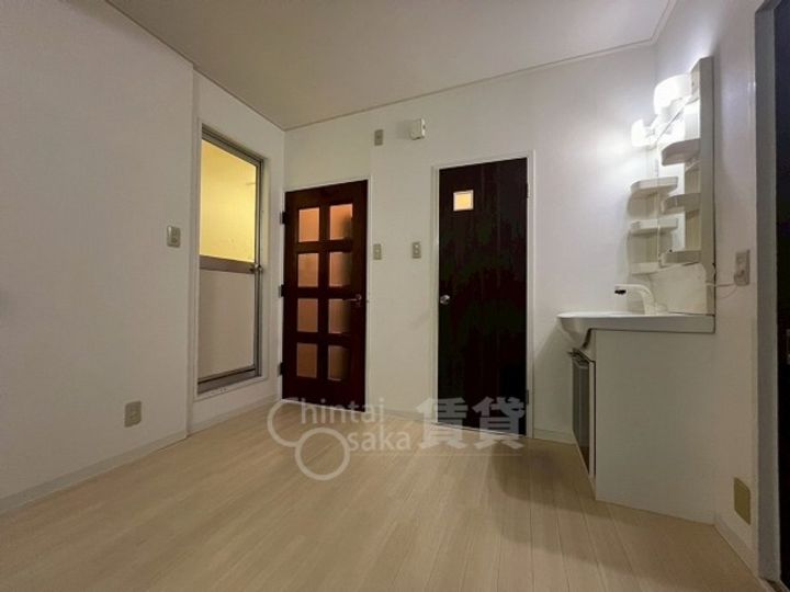 大阪府大阪市東淀川区菅原4丁目の賃貸マンションの居間