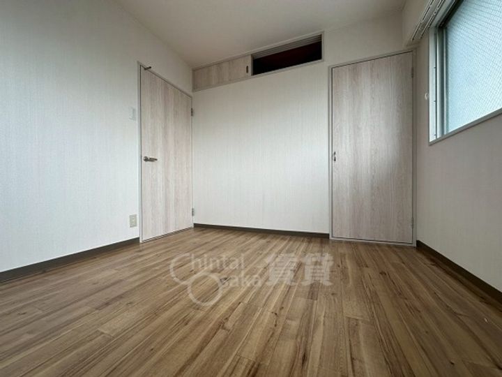 大阪府摂津市千里丘3丁目の賃貸マンションの居間