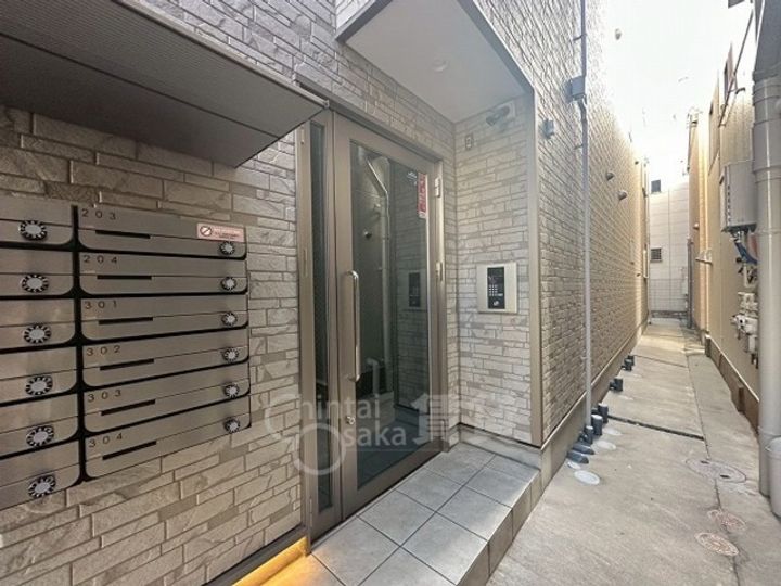 Act塚本5丁目の玄関