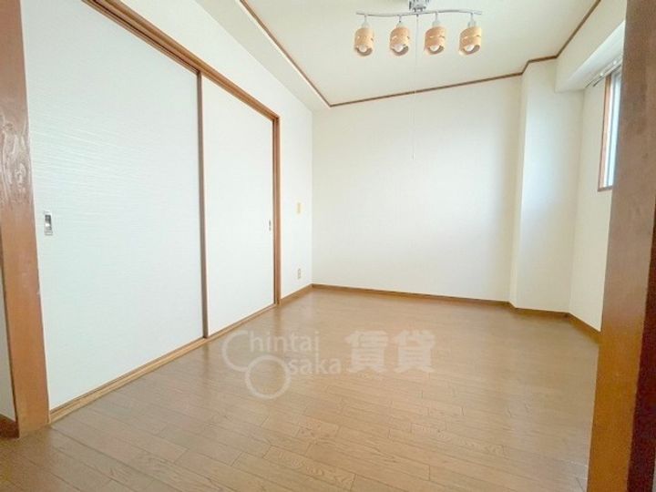 大阪府大阪市東淀川区豊里6丁目の賃貸マンションの居間