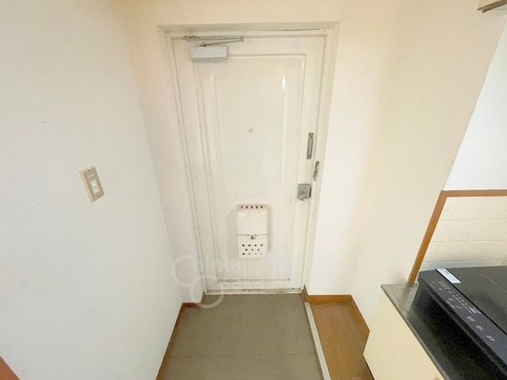 大阪府大阪市東淀川区豊里6丁目の賃貸マンションの玄関