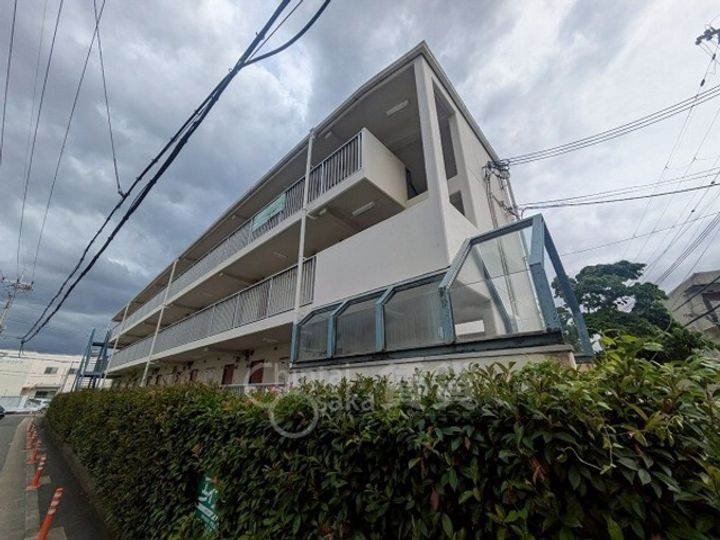 大阪府茨木市蔵垣内2丁目の賃貸マンションの外観