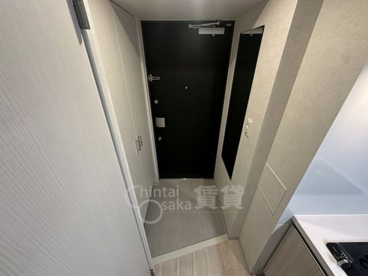 ファーストフィオーレ吹田レガーメの玄関