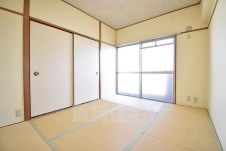 大阪府摂津市鶴野4丁目の賃貸マンションの寝室