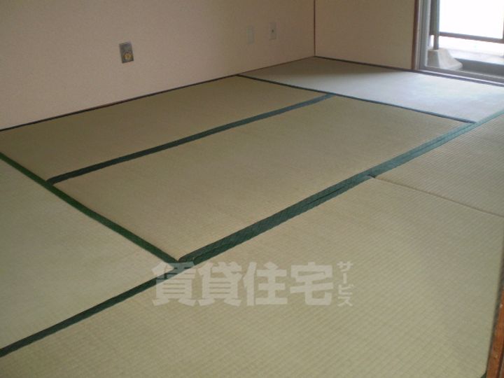 大阪府茨木市庄2丁目の賃貸マンションの寝室