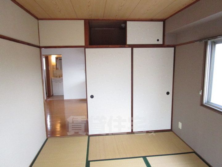 大阪府茨木市庄2丁目の賃貸マンションの居間