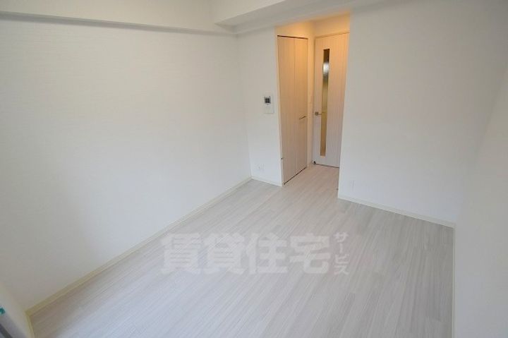 プレサンスOSAKA三国ネオスの寝室