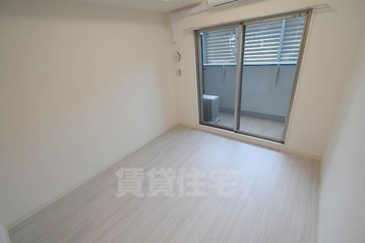 プレサンスOSAKA三国ネオスの寝室