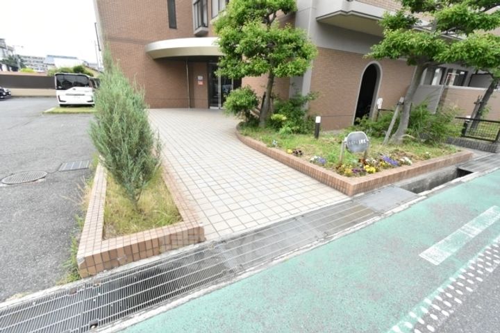 大阪府堺市西区上野芝向ヶ丘町6丁の賃貸マンションの玄関