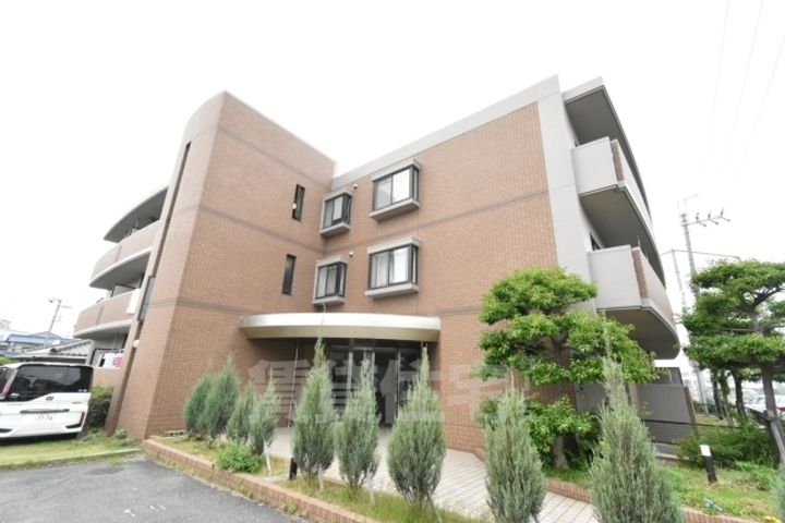 大阪府堺市西区上野芝向ヶ丘町6丁の賃貸マンションの外観