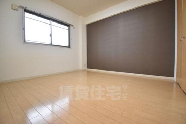 大阪府摂津市千里丘東5丁目の賃貸マンションの居間