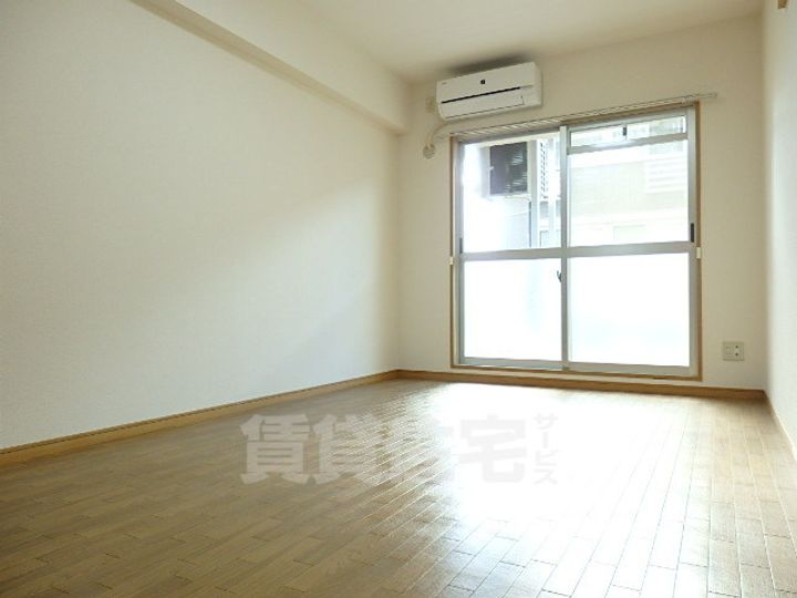 滋賀県草津市野路東4丁目の賃貸マンションの居間