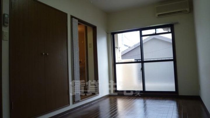 京都府京都市伏見区新町11丁目の賃貸マンションの居間