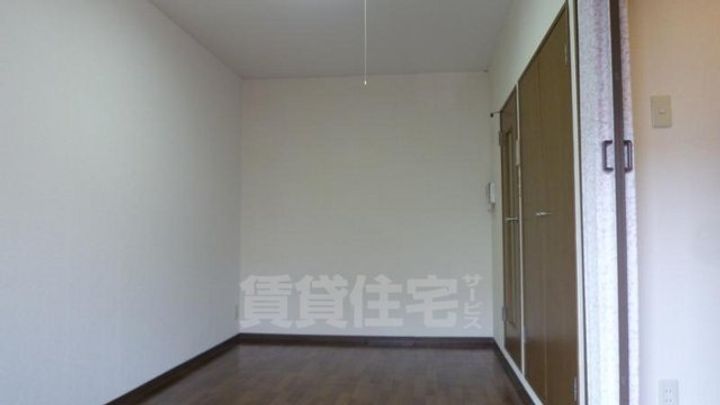 京都府京都市伏見区新町11丁目の賃貸マンションの居間