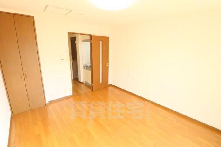 大阪府吹田市佐井寺4丁目の賃貸マンションの居間