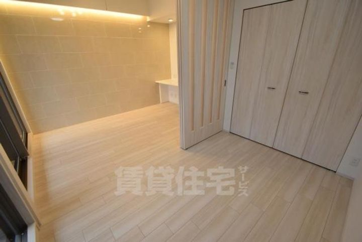大阪府大阪市都島区大東町1丁目の賃貸マンションの居間