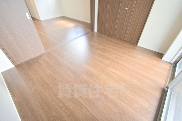 大阪府大阪市淀川区新高6丁目の賃貸マンションの居間