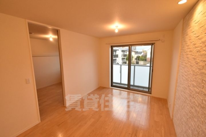 大阪府堺市西区鳳東町4丁の賃貸マンションの居間