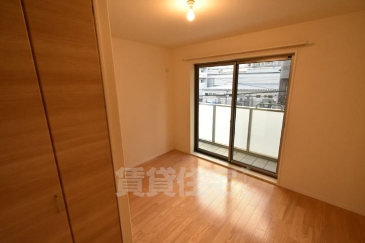 大阪府堺市西区鳳東町4丁の賃貸マンションの寝室