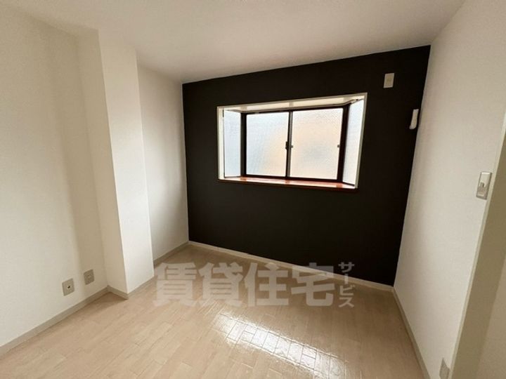 メゾンパシフィック三津屋302の寝室