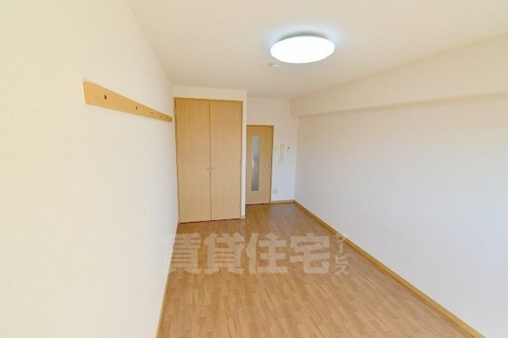 滋賀県草津市野路東4丁目の賃貸マンションの居間