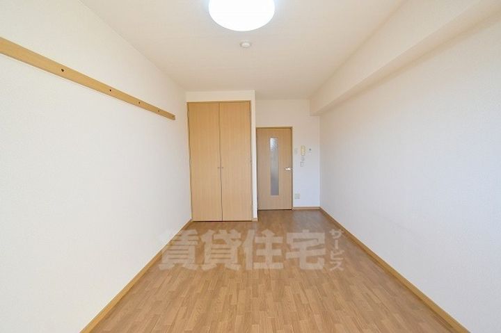 滋賀県草津市野路東4丁目の賃貸マンションの居間