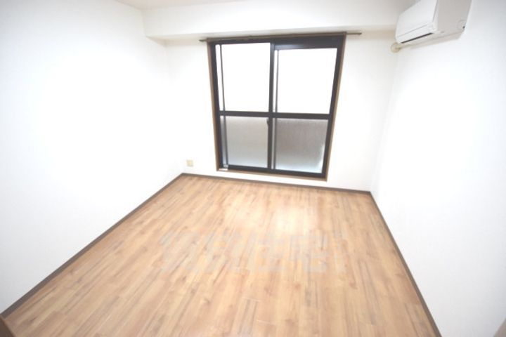 大阪府堺市西区上野芝町2丁の賃貸マンションの居間