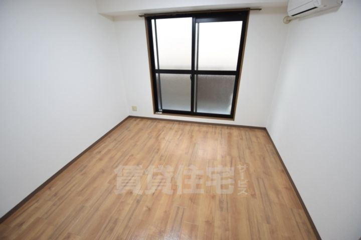 大阪府堺市西区上野芝町2丁の賃貸マンションの寝室