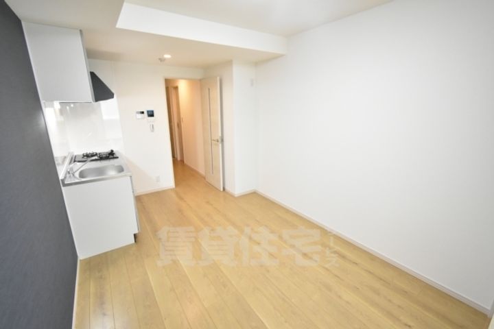 大阪府堺市西区浜寺石津町西4丁の賃貸アパートの居間