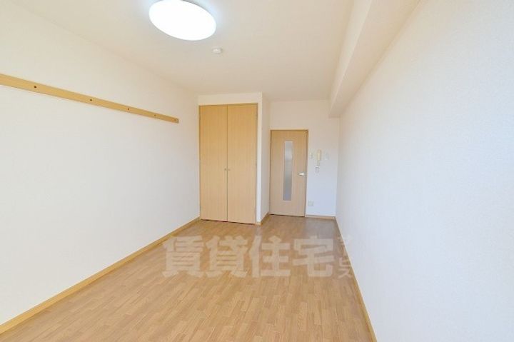 滋賀県草津市野路東4丁目の賃貸マンションの居間