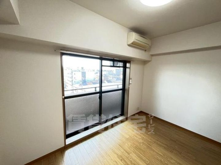 大阪府豊中市庄内西町4丁目の賃貸マンションの寝室