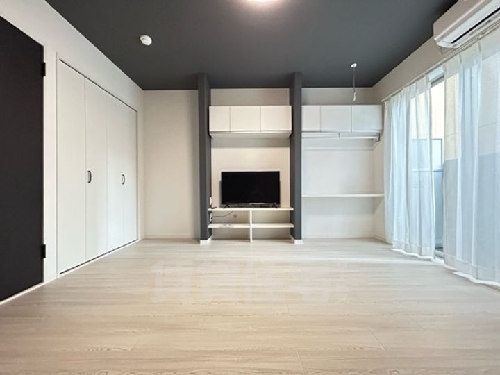 大阪府堺市堺区九間町西2丁の賃貸マンションの居間
