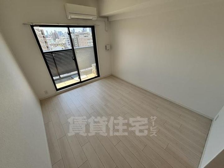 大阪府大阪市都島区都島北通1丁目の賃貸マンションの居間