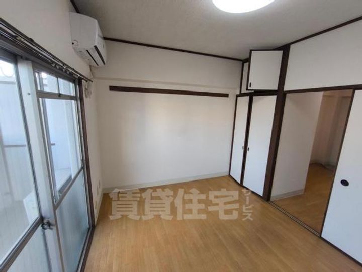 大阪府豊中市螢池西町1丁目の賃貸マンションの寝室