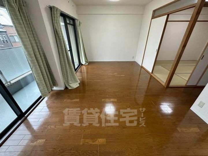 大阪府豊中市永楽荘4丁目の賃貸マンションの居間