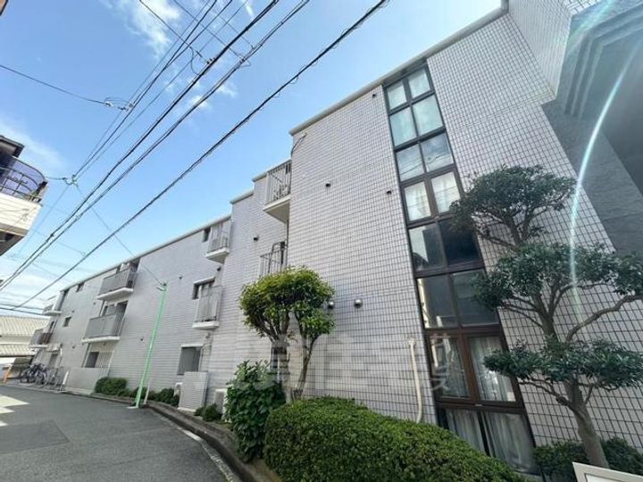 大阪府豊中市岡上の町1丁目の賃貸マンションの外観